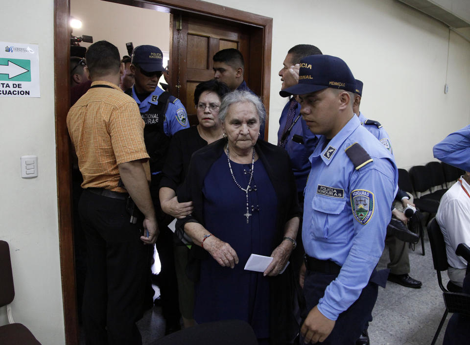 Berta Austria flores, mother of Honduran indigenous and environmental rights activist Berta Caceres, enters the courtroom where Caceres' murderers are being tried, in Tegucigalpa, Honduras, Thursday, Nov. 29, 2018. Seven of the eight accused in the murder of Caceres were found guilty and will be sentenced on January 2019. (AP Photo/Fernando Antonio)