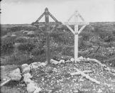 <p>The graves of Lt. A. Malcolm, Pte. J.S. Pollock and Pte. W.B. Woodworth of the 43rd Infantry are photographed in May 1918. Photo from Library and Archives Canada. </p>