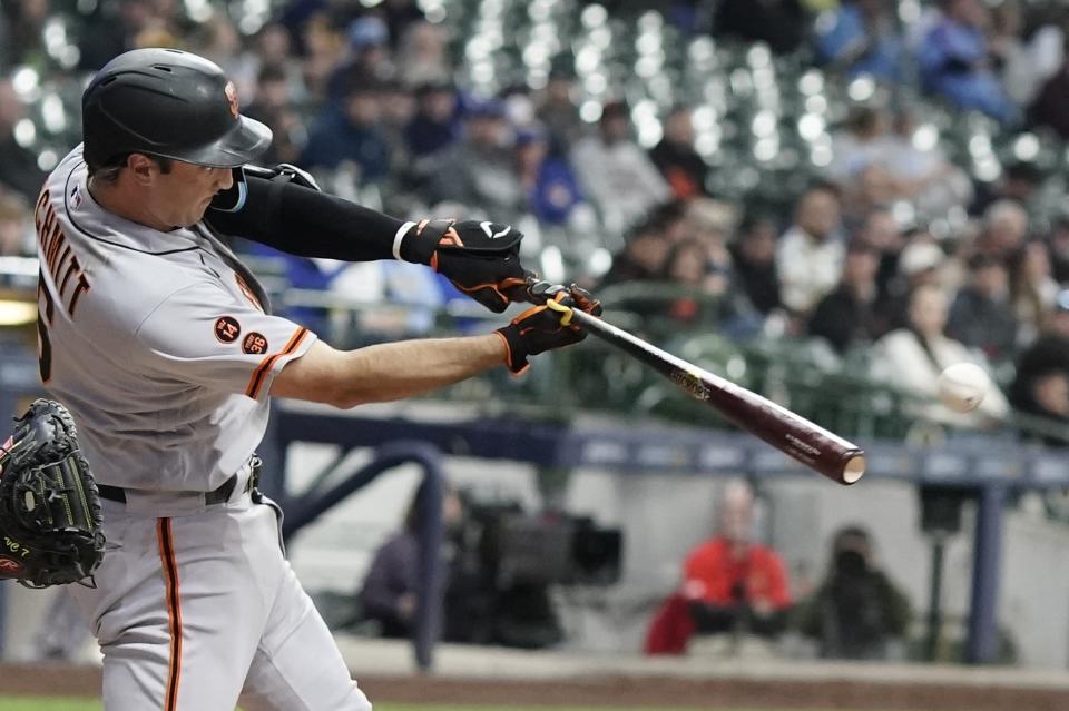 San Francisco Giants' Casey Schmitt hits a single during the fifth inning of a baseball game against the Milwaukee Brewers Thursday, May 25, 2023, in Milwaukee. (AP Photo/Morry Gash)