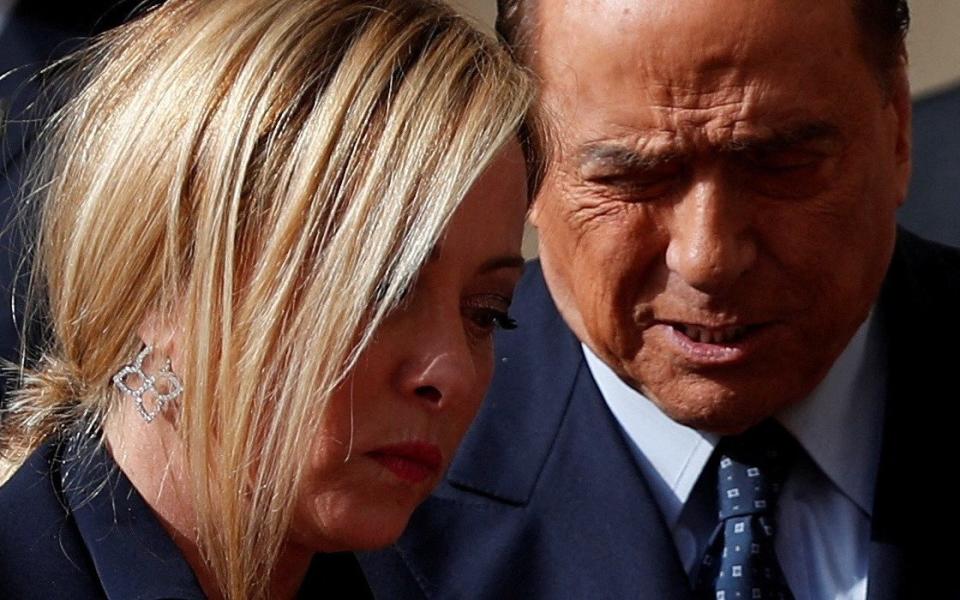 Meloni Berlusconi - Reuters/Guglielmo Mangiapane