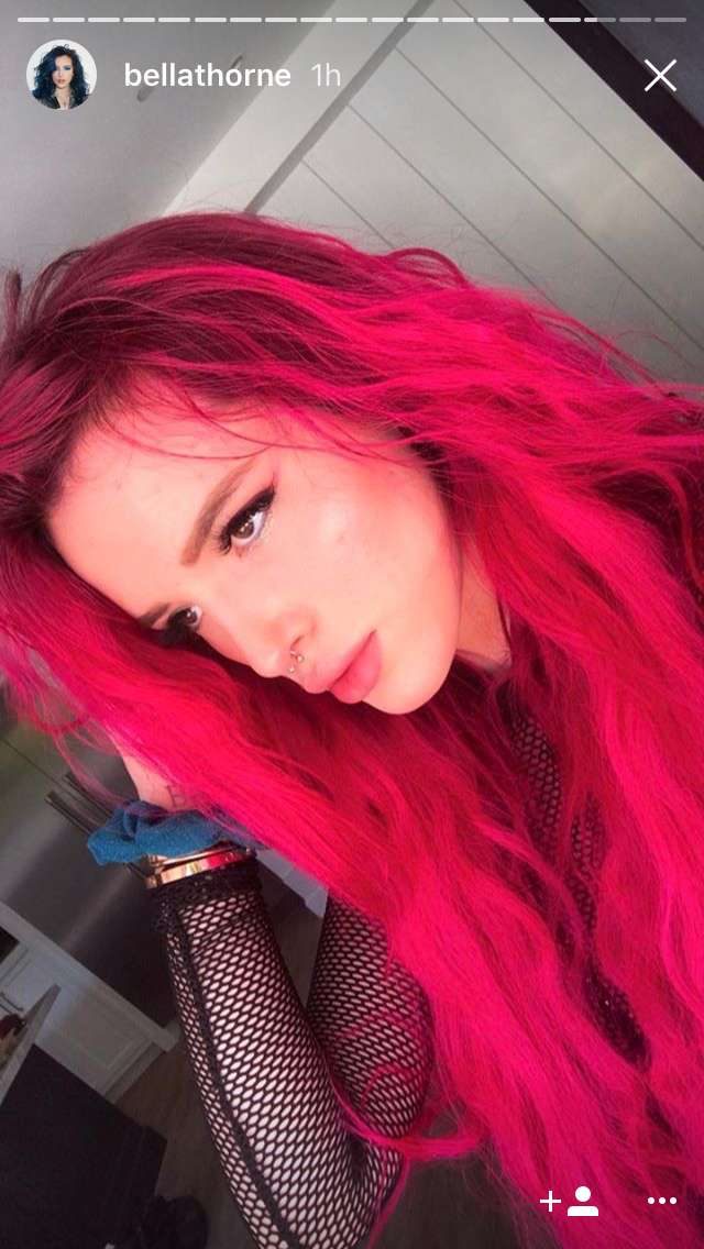 Image of Bella Thorne with pink hair