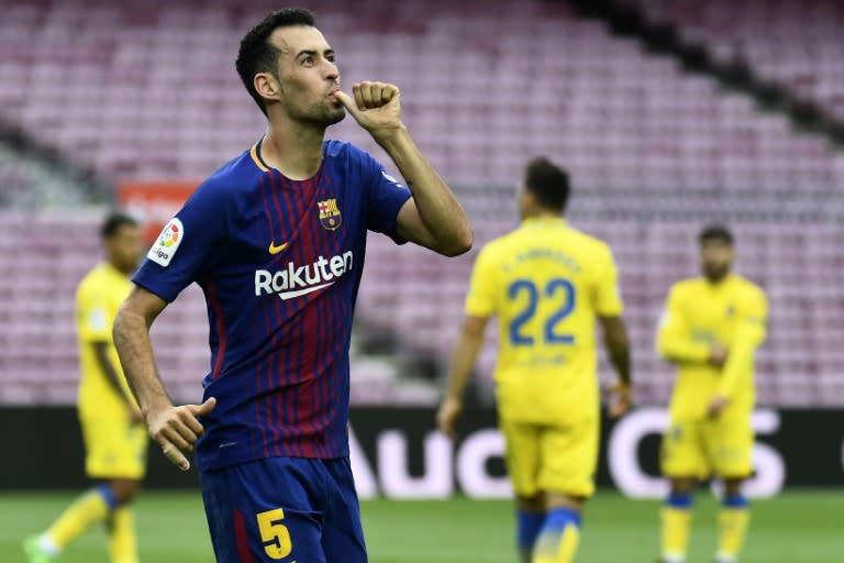 Barcelona's midfielder Sergio Busquets celebrates after scoring a goal against Las Palmas at the Camp Nou stadium in Barcelona on October 1, 2017