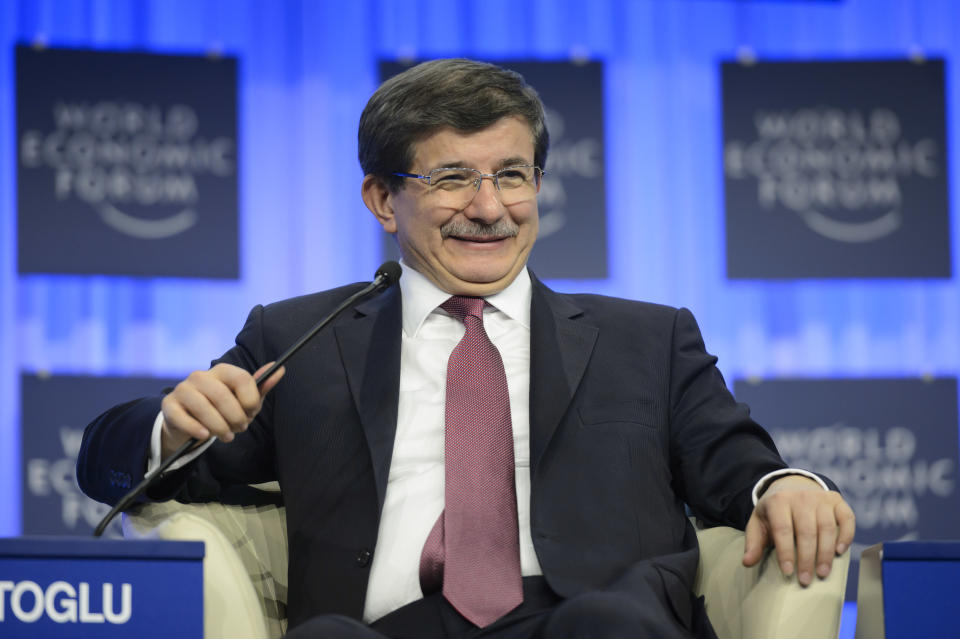 Ahmet Davutoglu, Minister of Foreign Affairs of Turkey, attends a panel session on the third day of the 44. Annual Meeting of the World Economic Forum, WEF, in Davos, Switzerland, Friday, Jan. 24, 2014. (AP Photo/Keystone,Laurent Gillieron)