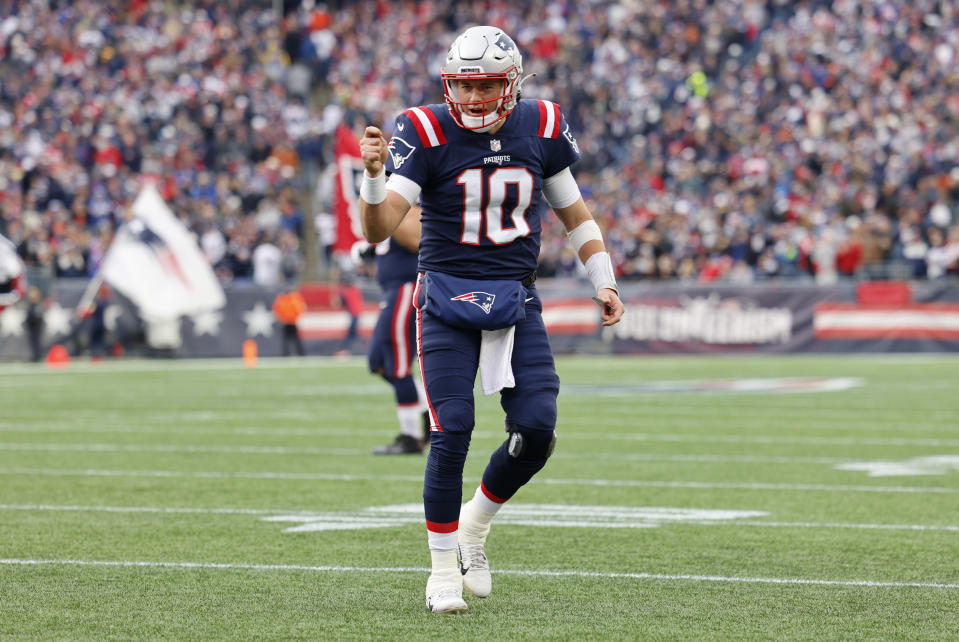 FOXBOROUGH, MA - NOVEMBER 14: New England Patriots quarterback Mac Jones (10) celebrates a score during a game between the New England Patriots and the Cleveland Browns on November 14, 2021, at Gillette Stadium in Foxborough, Massachusetts. (Photo by Fred Kfoury III/Icon Sportswire via Getty Images)