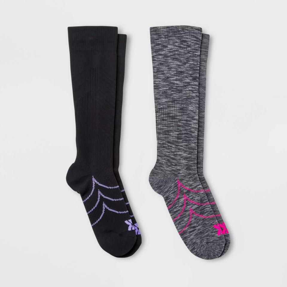The knee-length socks in black and gray with purple and hot pink accents