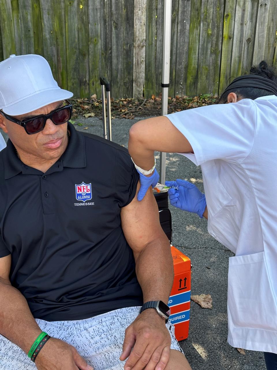 Al Smith getting his COVID vaccine