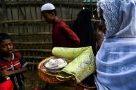 Relatives take part in marriage celebrations in Kutupalong refugee camp