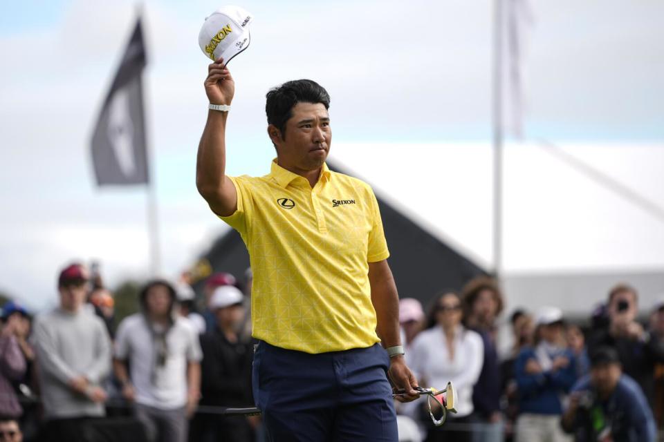 Hideki Matsuyama celebrates his win on the 18th green during the final round of the Genesis Invitational on Sunday.