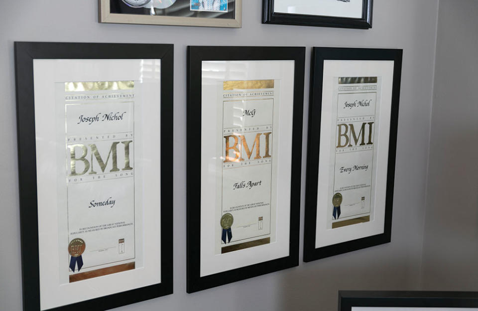Inside McG’s Wonderland office are a trio of BMI certificates for his work co-writing and producing with Sugar Ray early in his career - Credit: Photographed by Emily Malan