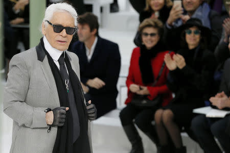 Karl Lagerfeld appears at the end of his Haute Couture Spring Summer 2015 fashion show for Chanel. REUTERS/Gonzalo Fuentes