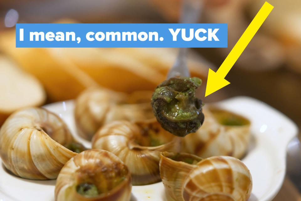 A fork holding an escargot