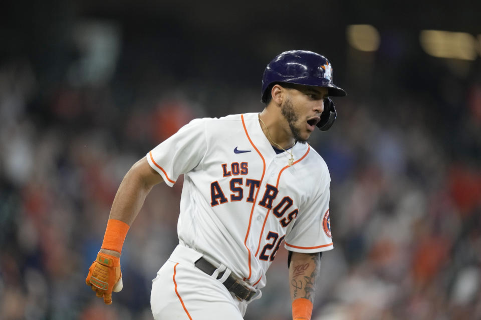 Houston Astros' Jose Siri celebrates after hitting a two-run home run against the Arizona Diamondbacks during the eighth inning of a baseball game Sunday, Sept. 19, 2021, in Houston. The Astros won 7-6. (AP Photo/David J. Phillip)