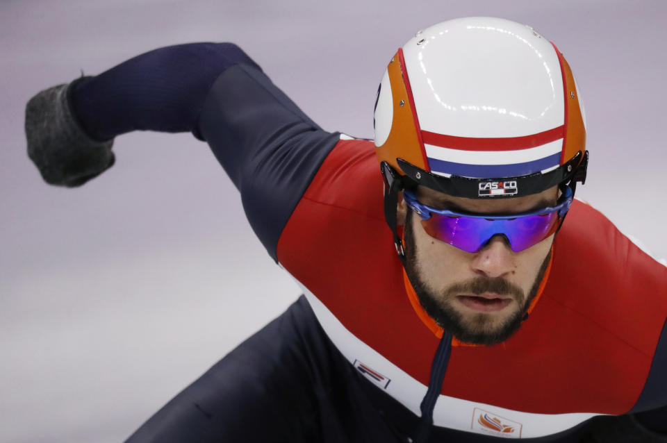 In this Feb. 13, 2018 file image Sjinkie Knegt of the Netherlands races during the men's 1000 meters short track speedskating heats in the Gangneung Ice Arena at the 2018 Winter Olympics in Gangneung, South Korea. The Dutch ice skating association said Olympic short track speedskating silver medalist Knegt has suffered serious burns after his clothes caught fire Thursday morning Jan. 10, 2019, as he was lighting a wood-burning stove. (AP Photo/Bernat Armangue)