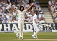 India's Ishant Sharma appeals and dismisses England's Ian Bell (R) during their first cricket test match at Trent Bridge cricket ground in Nottingham, England July 11, 2014. REUTERS/Philip Brown