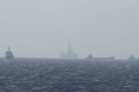 Chinese oil rig Haiyang Shi You 981 (C) is seen in the South China Sea, off the shore of Vietnam in this May 14, 2014 file photo. REUTERS/Minh Nguyen/Files