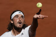 Stefanos Tsitsipas of Greece serves the ball to Serbia's Novak Djokovic during their final match of the French Open tennis tournament at the Roland Garros stadium Sunday, June 13, 2021 in Paris. (AP Photo/Thibault Camus)