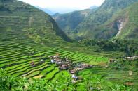 Rice Terraces of the Cordilleras<br><br>More than 2,000 years ago, the Ifugao tribe of the Philippines carved off parts of the Cordillera mountain range to plant rice. If those centuries-old rice terraces aren’t impressive enough, think about this: if laid side-by-side, the terraces span about 22,400 kilometers, which is believed to encircle half the globe! There are five rice terraces in the Cordilleras included in the cultural landscape category of the World Heritage List: Batad, Bangaan, Mayoyao, Hungduan and Nagacadan. The view to stop you most in your tracks is the one of Batad, with its ampitheatre-shaped terraces. To get there, you need to take a butt-numbing 9-hour bus ride from Manila to Banaue (that’s the most direct way), and let the sleepy mountain towns and endless mountain views welcome you to the terraces.