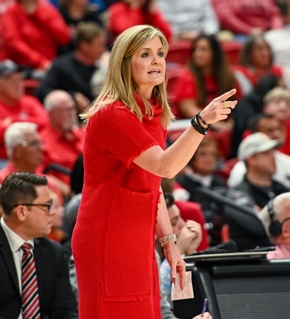 Texas Tech's head coach Krista Gerlich directs her players from the bench at the game on Saturday, Jan. 8, 2022, at United Supermarkets Arena in Lubbock, Texas.