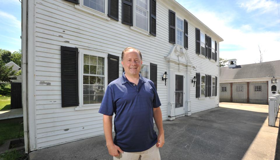 Tim O'Connell standing at the Elm Arch Inn property in June 2018.