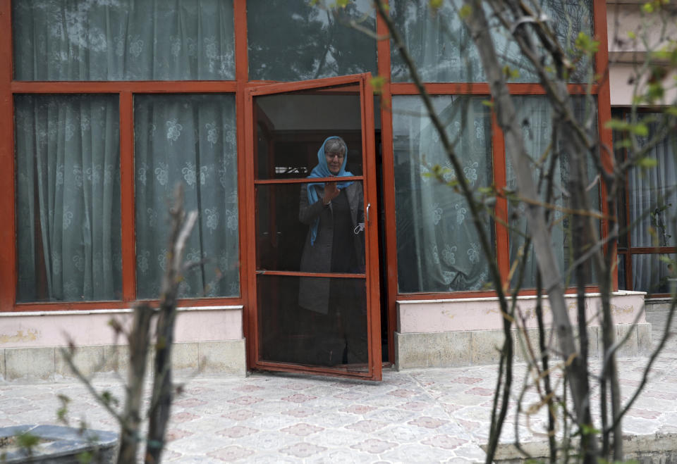 Sima Samar, a prominent activist and physician, who has been fighting for women’s rights in Afghanistan for the past 40 years, leaves her house for work, in Kabul, Afghanistan, Saturday, March 6, 2021. She believes her struggle is far from over -- especially at a time when violence is on the rise, peace talks between rival Afghan groups are stuck and the U.S. mulls its departure. (AP Photo/Rahmat Gul)