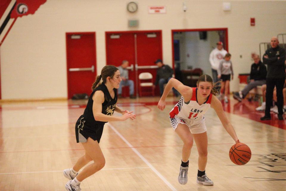 Tri County junior Sara Zarse attacks the left lane against Mt. Vernon during the Twin Lakes Holiday Tournament on Wednesday, Dec. 27, 2023.