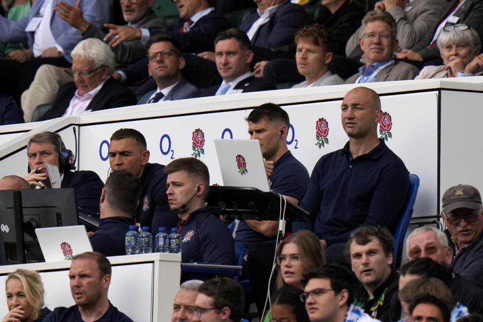 England's head coach Steve Borthwick, right, with his coaching staff watch on the rugby union international match between England and Fiji at Twickenham stadium in London, Saturday, Aug. 26, 2023. (AP Photo/Alastair Grant)