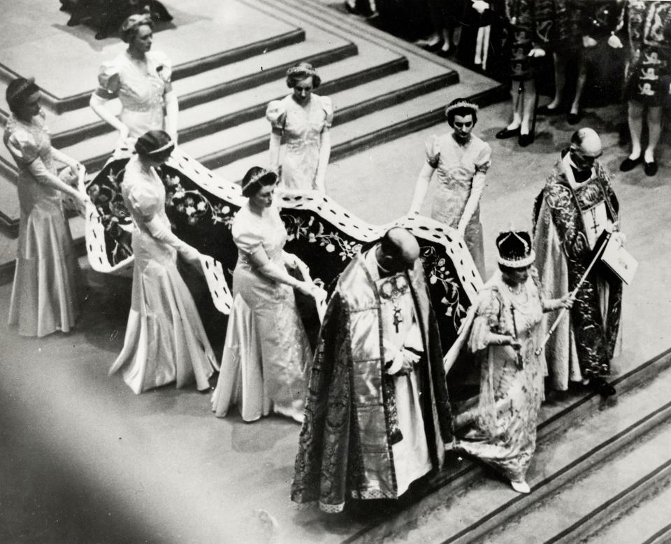 Queen Elizabeth (later the Queen Mother) holding her two sceptres at George VI's coronation in 1937 