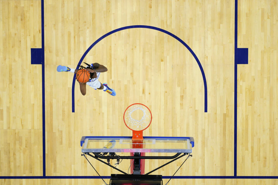 Kentucky's Rob Dillingham goes up for a dunk during the second half of an NCAA college basketball game against Pennsylvania, Saturday, Dec. 9, 2023, in Philadelphia. (AP Photo/Matt Slocum)