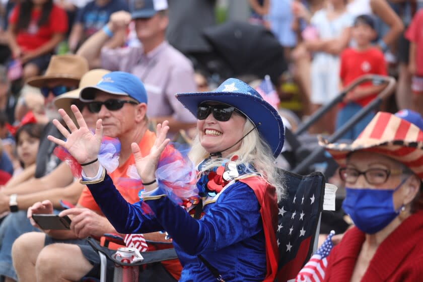 HUNTINGTON BEACH, CA - JULY 04: Elizabeth McLeod, of Huntington Beach, at the Huntington Beach Fourth of July Parade along Main Street in downtown on Monday, July 4, 2022 in Huntington Beach, CA. (Gary Coronado / Los Angeles Times)