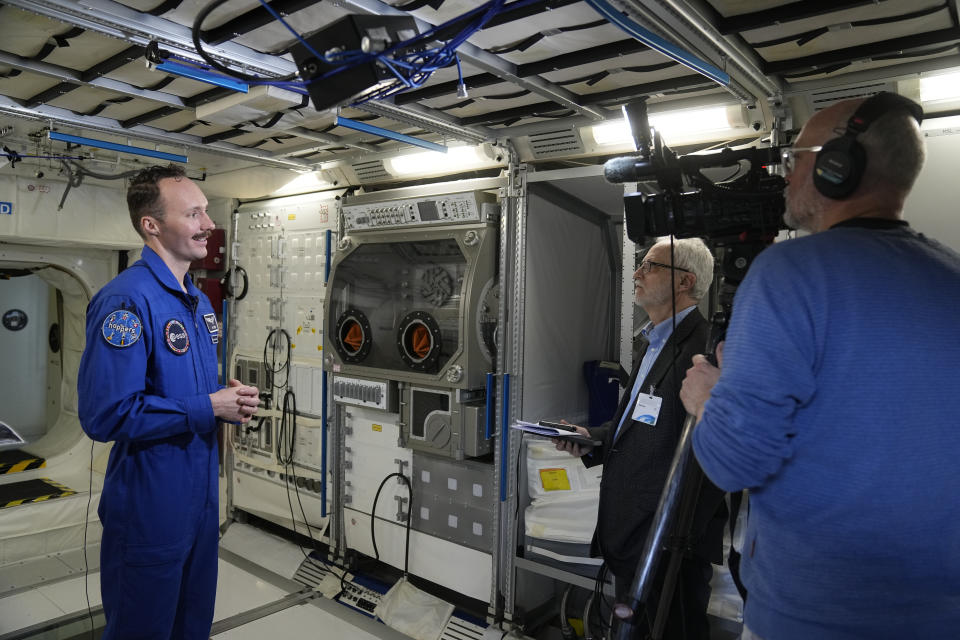 Marco Sieber of Switzerland talks to the Associated Press in a Columbus trainings module after the candidates of the Class of 2022 graduation ceremony at the European Astronaut Centre in Cologne, Germany, Monday, April 22, 2024. ESA astronaut candidates Sophie Adenot of France, Pablo Alvarez Fernandez of Spain, Rosemary Coogan of Britain, Raphael Liegeois of Belgium and Marco Sieber of Switzerland took up duty at the European Astronaut Centre one year ago to be trained to the highest level of standards as specified by the International Space Station partners. Also concluding a year of astronaut basic training is Australian astronaut candidate Katherine Bennell-Pegg, who has trained alongside ESA's candidates. (AP Photo/Martin Meissner)