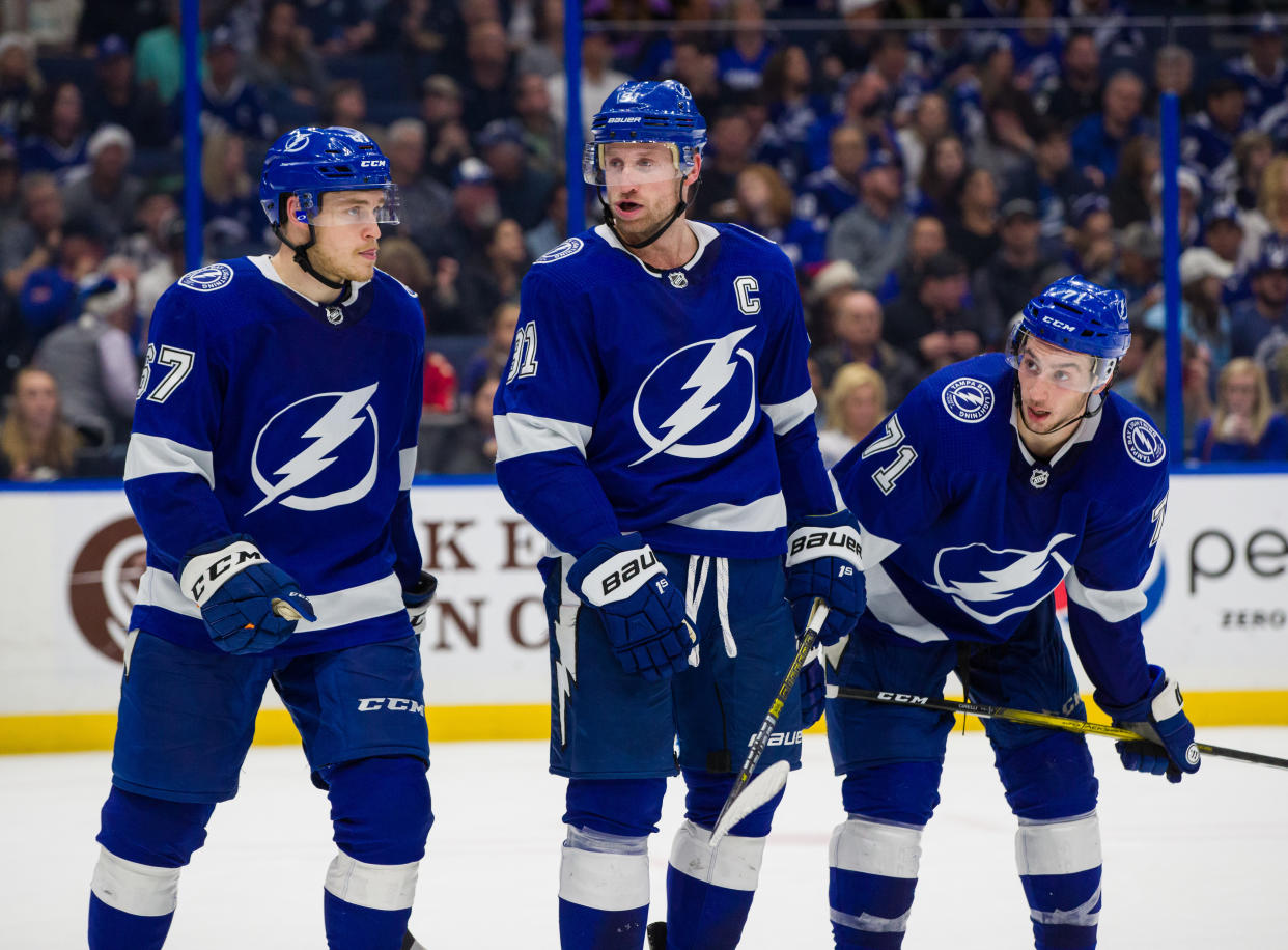 TAMPA, FL - DECEMBER 23: Steven Stamkos #91, Mitchell Stephens #67, and Anthony Cirelli #71 of the Tampa Bay Lightning skates against the Florida Panthers during the second period at Amalie Arena on December 23, 2019 in Tampa, Florida (Photo by Mark LoMoglio/NHLI via Getty Images)