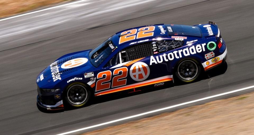 Joey Logano races at Sonoma.