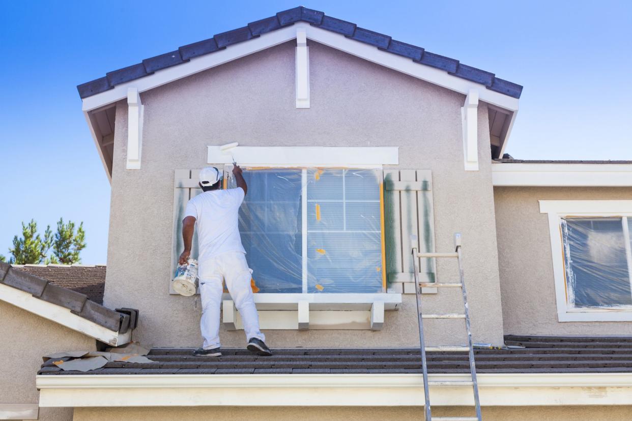 house painter painting second level