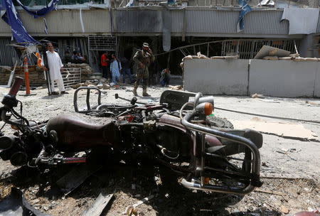 An Afghan security force stands guard at the site of a suicide bomb attack in Kabul, Afghanistan August 29, 2017. REUTERS/Omar Sobhani