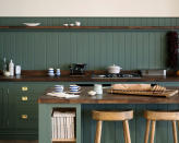 <p> If you have tall ceilings or a large open plan kitchen space, lean into the richness of a dark green by teaming it with a dark wood counter top. The combination of the two, instantly draws you in and adds depth, bringing character to a new build or freshly renovated room. Carry the green up the walls to cocoon the room, adding a top level shelf in the same dark wood to bring the space in, even further. </p> <p> Al Bruce, Founder of Olive &amp; Barr explains how to make it work, &apos;Keeping the walls free of units allows the green to take centre focus without overpowering the space. Anchor the scheme with dark wood counter tops, complemented by a subtle floating shelf and brushed mental hardware for a crisp contrast.&apos; </p>