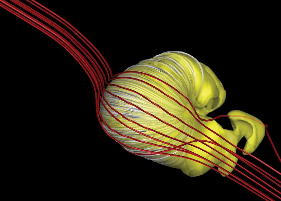 An updated model suggests the shape of the Sun's bubble of influence, the heliosphere (seen in yellow), may be a deflated croissant shape, rather than the long-tailed comet shape suggested by other research: Opher, et al