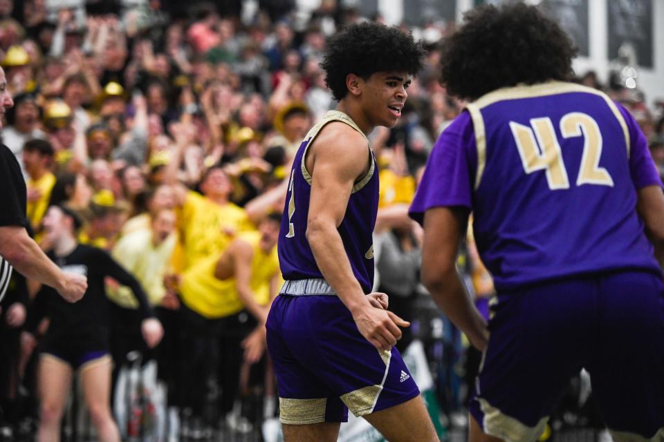 Fort Collins' Jayce King (2) celebrates in a boys high school basketball game against Fossil Ridge at Fossil Ridge High School on Jan. 31.