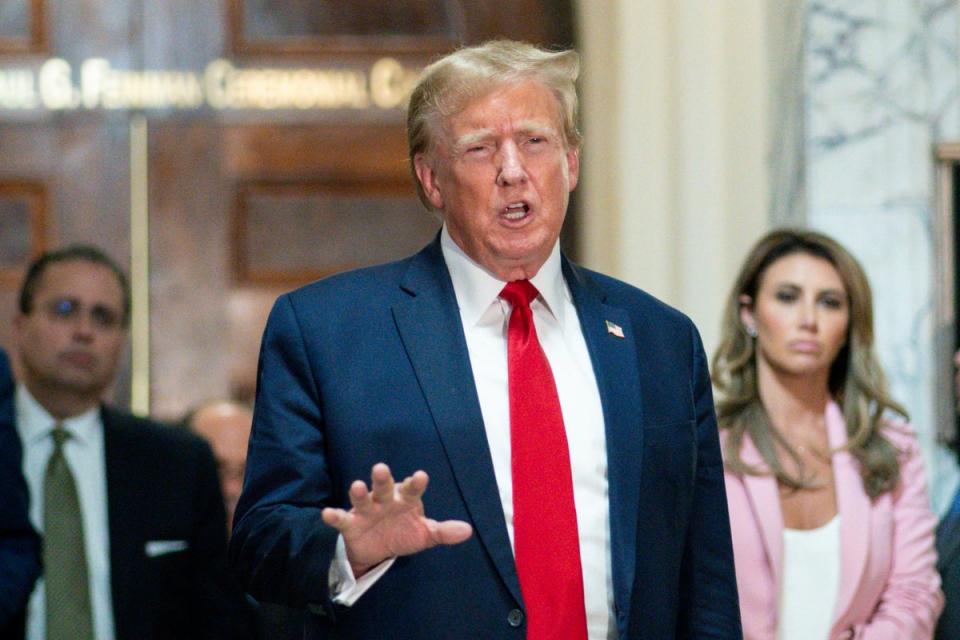 Donald Trump speaks to reporters at his civil fraud trial in New York on 7 December, 2023. (AP)