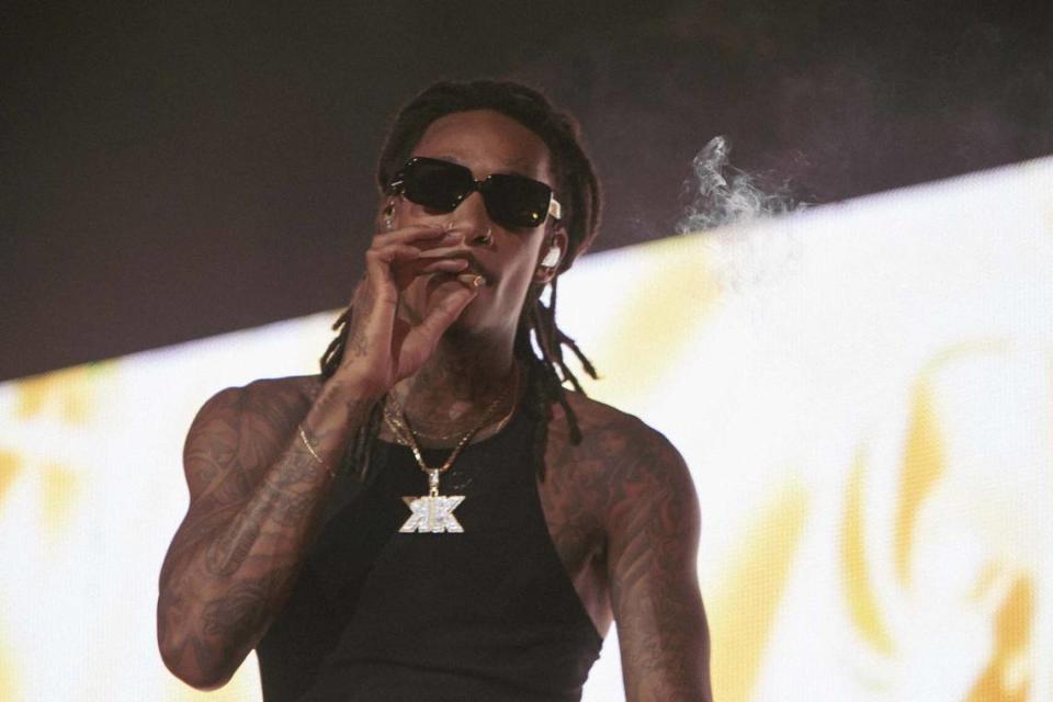 Wiz Khalifa doing him thing at PNC Music Pavilion during a concert he co-headlined there with Logic last August.