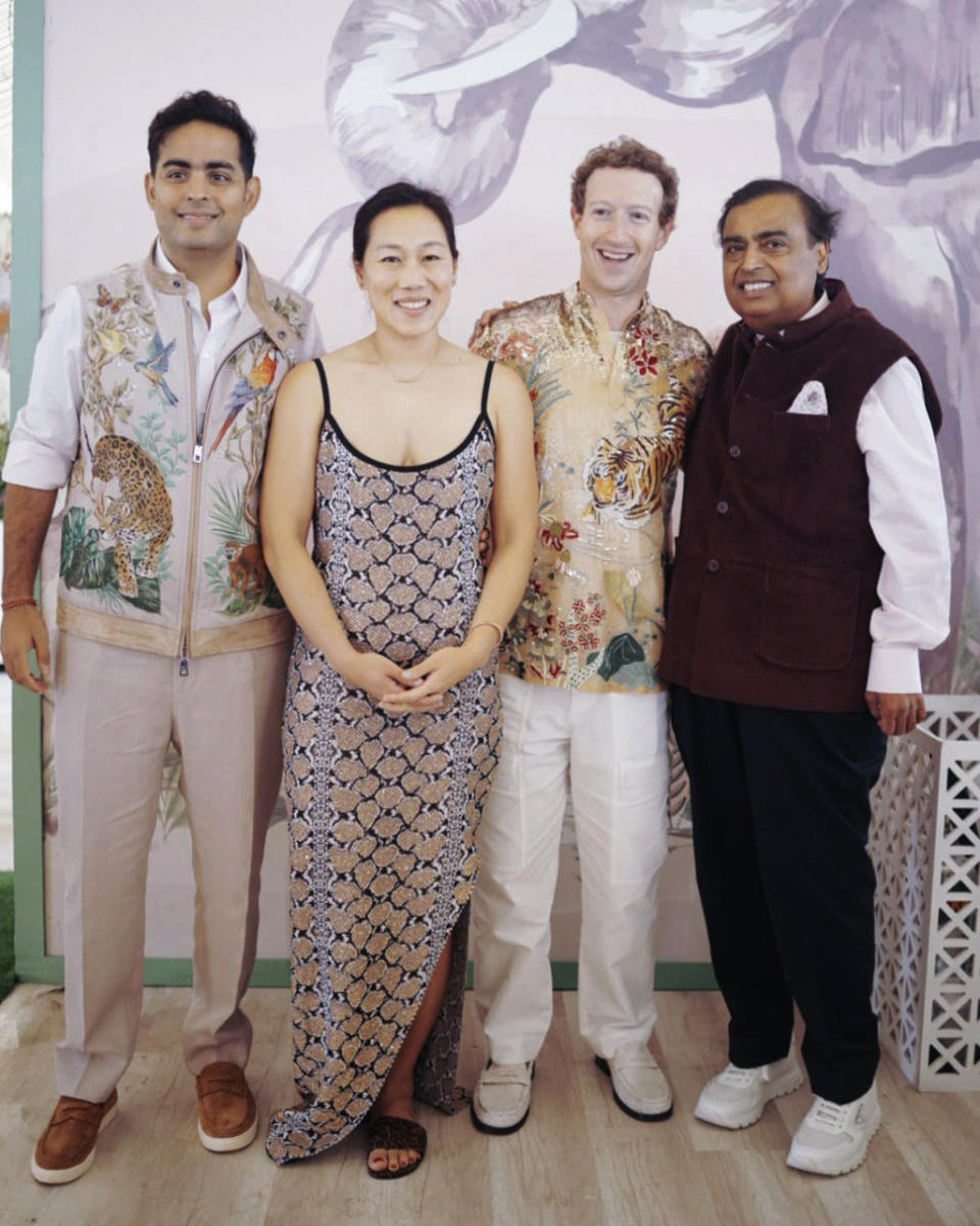This photograph released by the Reliance group shows R to L, billionaire industrialist Mukesh Ambani, Mark Zuckerberg, Priscilla Chan, and Akash Ambani posing for a photograph at a pre-wedding bash of Mukesh Ambani's son Anant Ambani in Jamnagar, India, Saturday, Mar. 02, 2024. (Reliance group via AP)