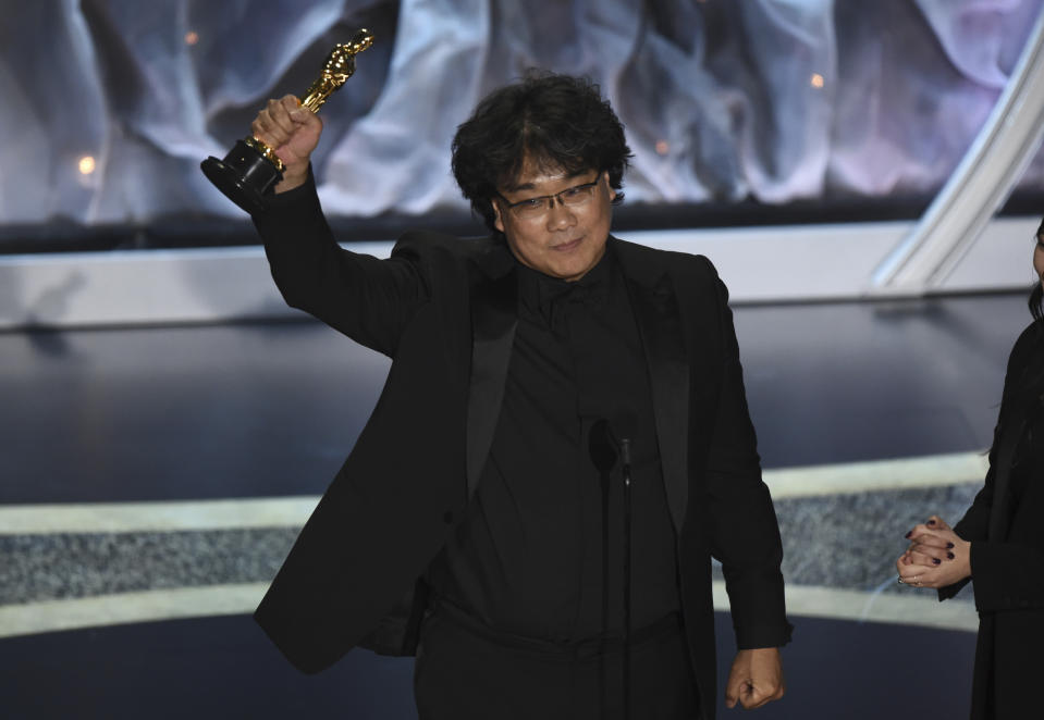 Bong Joon Ho accepts the award for best international feature film for "Parasite," from South Korea, at the Oscars on Sunday, Feb. 9, 2020, at the Dolby Theatre in Los Angeles. (AP Photo/Chris Pizzello)