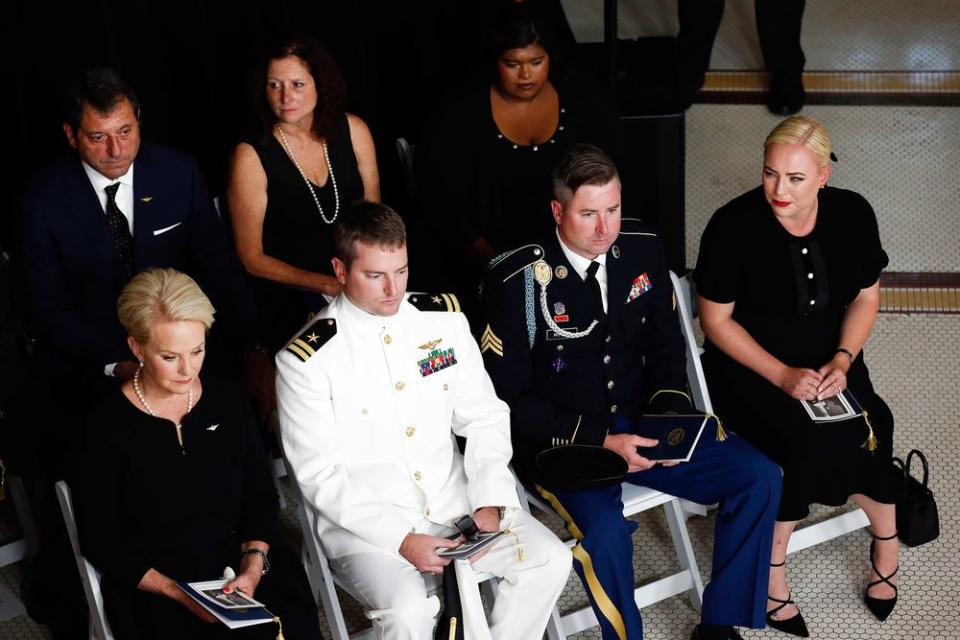 Cindy McCain, wife of Sen. John McCain, R-Ariz. sits with her sons Jack and Jimmy, and daughter Meghan