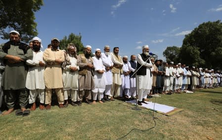 Siraj ul Haq, head of Pakistan's political and religious party Jama'at e Islami, leads the funeral prayers in absentia for the former Egyptian President Mohamed Mursi, in Peshawar
