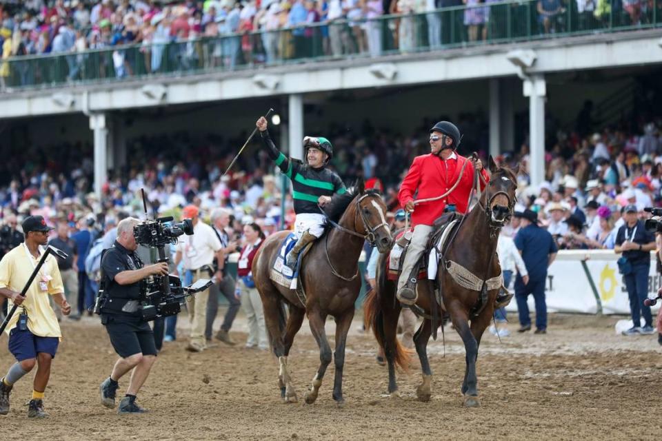 Jockey Brian Hernandez Jr. celebrates aboard Mystik Dan after their Kentucky Derby victory.