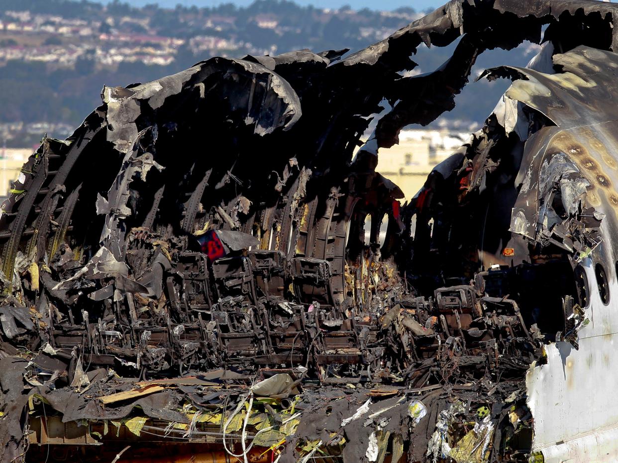 The burned interior of Asiana Airlines flight 214, as seen on Saturday July 13, 2013, in San Francisco, Calif. The aircraft has been moved to the north end of at San Francisco International Airport. (Photo by Michael Macor/San Francisco Chronicle via Getty Images)