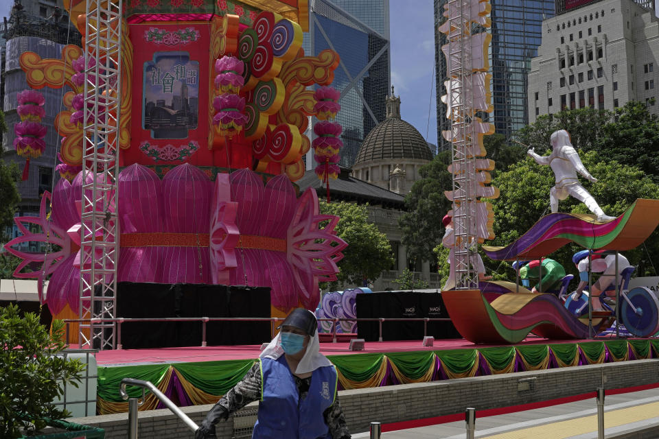 A giant lantern decorations is displayed to celebrate the 25th anniversary of Hong Kong handover to China, in Hong Kong, Monday, June 27, 2022. As the former British colony marks the 25th anniversary of its return to China, reeling from pandemic curbs that devastated business and a crackdown on its pro-democracy movement, Hong Kong leaders say it is time to transform again and become a tech center that relies more on ties with nearby Chinese factory cities than on global trade. (AP Photo/Kin Cheung)