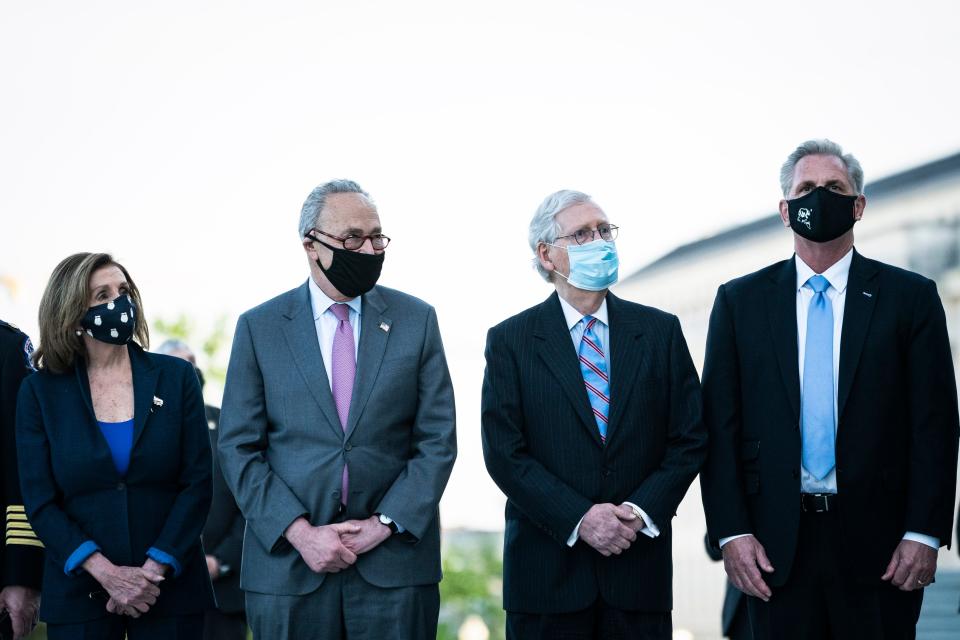 From left, House Speaker Nancy Pelosi, Senate Majority Leader Chuck Schumer, Senate Republican leader Mitch McConnell and House Republican leader Kevin McCarthy in April 2021 at a ceremony on Capitol Hill.