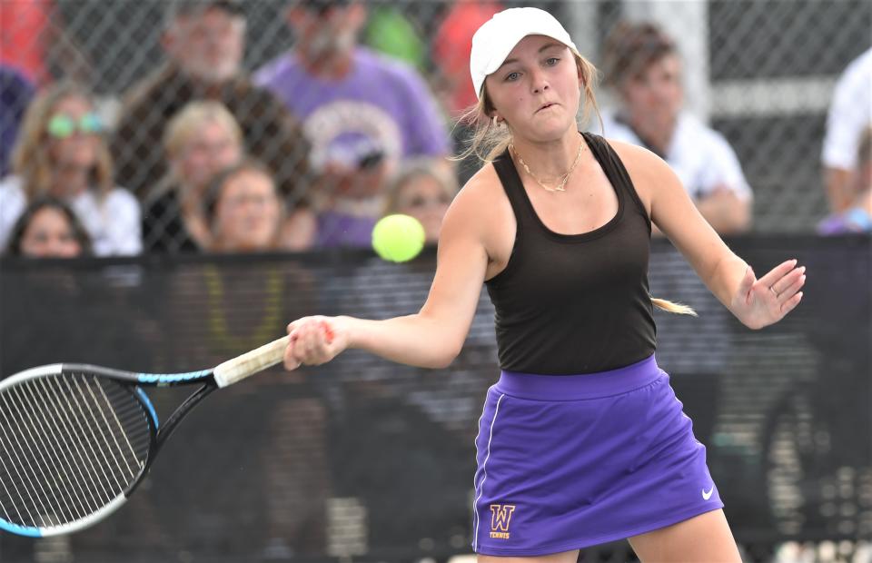 Abilene Wylie's Stealey Crousen returns a shot in her mixed doubles match against Frisco Lebanon Trail's Ashna Potluri and Aaditt Risha in the Class 5A state semifinals. Crousen and teammate Trevor Short won the match 6-4, 6-1 on Tuesday at Northside Tennis Club in Helotes.