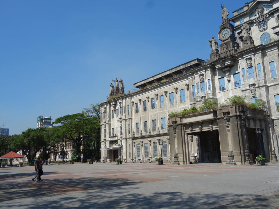 Scott with Brillante in school. Brillante takes Scott to the University of Santo Tomas, one of the country’s oldest institutions, where he majored in advertising.