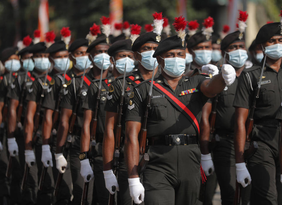 Sri Lankan army soldiers march during the 73rd Independence Day parade rehearsal in Colombo, Sri Lanka, Wednesday, Feb. 3, 2021. Sri Lanka's independence from British colonial rule is celebrated on Feb. 4 each year. (AP Photo/Eranga Jayawardena)